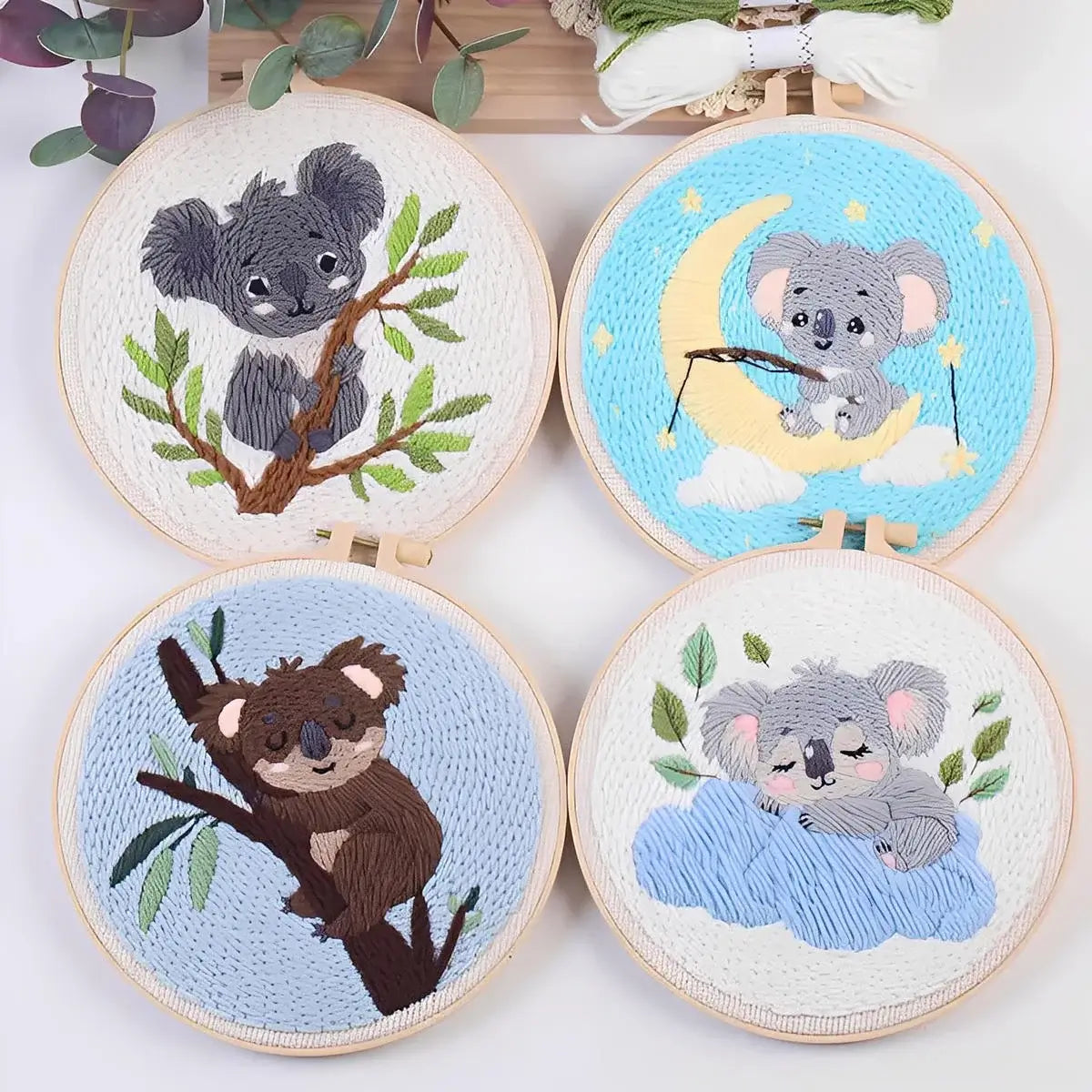 CraftHoop Cozy Koalas Punch Needle Kit featuring four adorable koala designs in embroidery hoops.