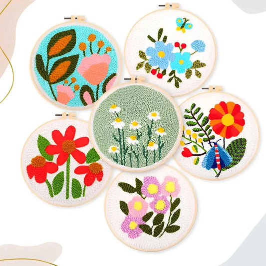 CraftHoop Garden Glow Punch Needle Kit featuring vibrant floral designs in colorful embroidery hoops.