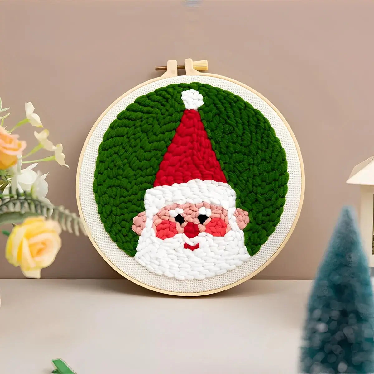 CraftHoop Christmas Cheer Punch Needle Kit featuring a festive Santa design in vibrant colors.