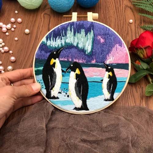 CraftHoop penguin family with snowy landscape embroidery - Fun and engaging DIY project for all ages