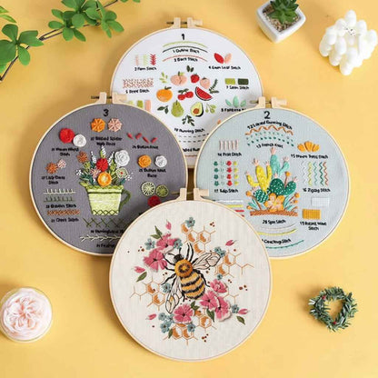 CraftHoop Fruity Florals Beginner Kit includes four embroidery hoop designs with floral and bee patterns.