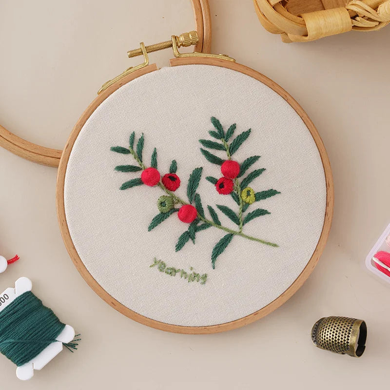 CraftHoop red and green floral embroidery in wooden hoop - Beginner-friendly DIY sewing kit