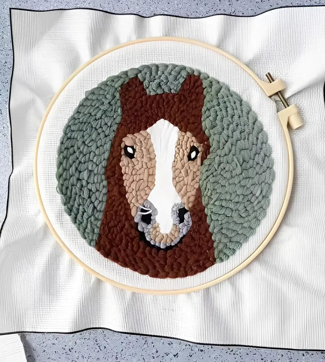 CraftHoop Farm Friends Punch Needle Kit showcasing a beautifully crafted horse design in a colorful hoop.