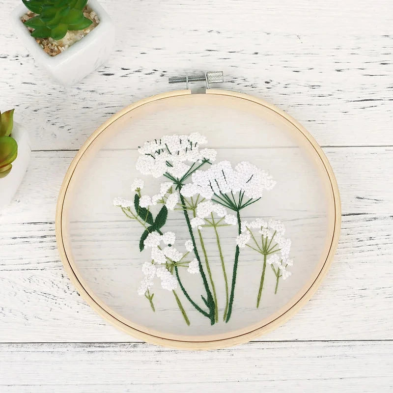 CraftHoop white floral embroidery on beige fabric - Serene and relaxing DIY sewing project