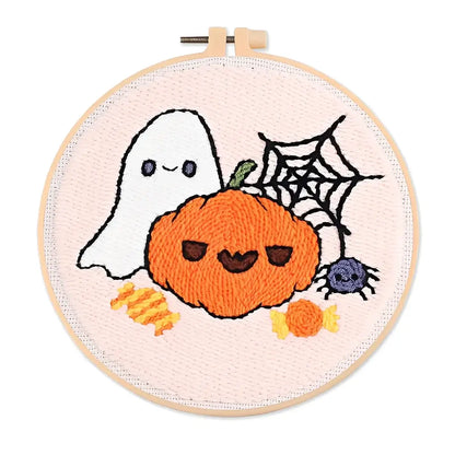 CraftHoop Pumpkin Halloween Punch Needle Kit featuring a ghost, pumpkin, spider, and candy.