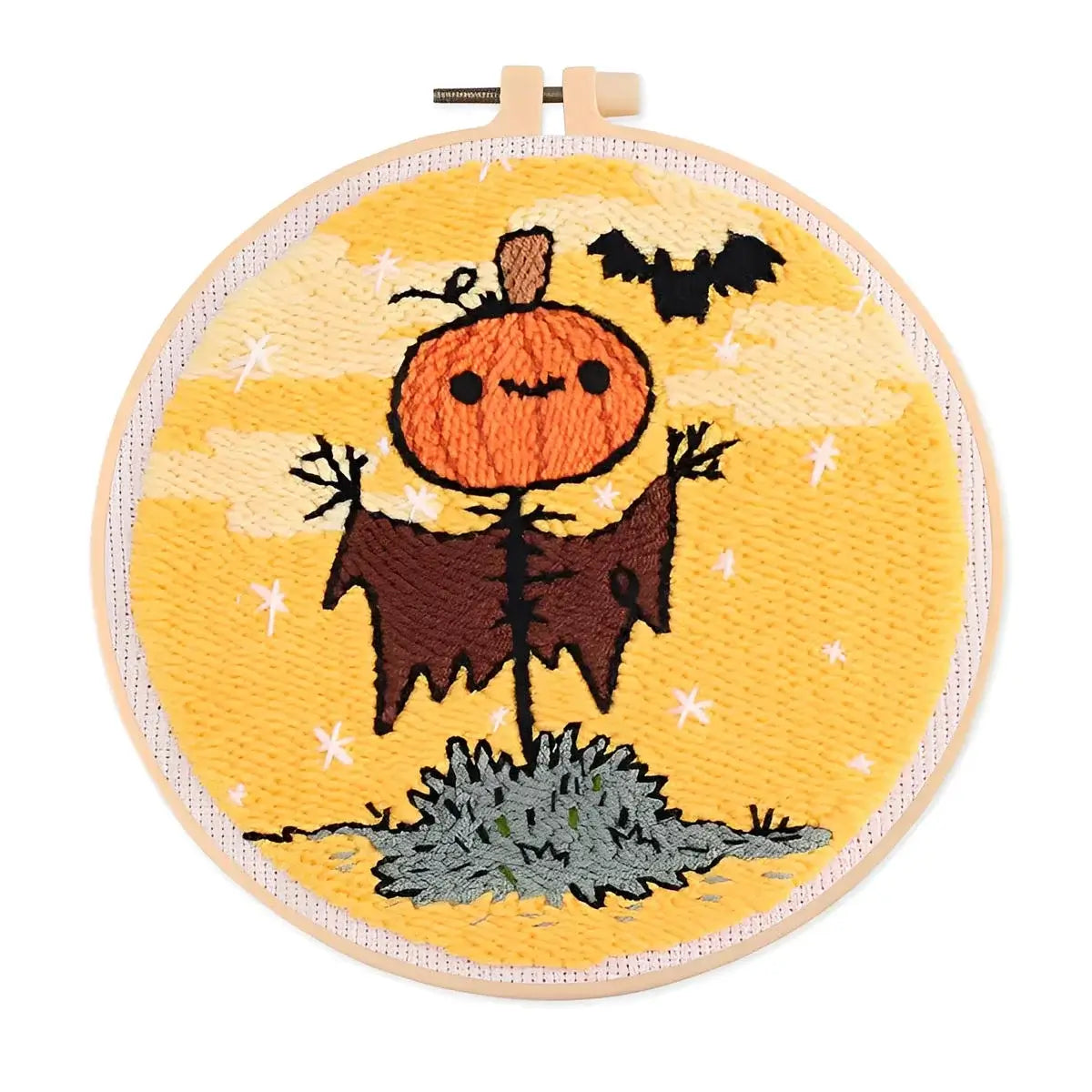 CraftHoop Pumpkin Halloween Punch Needle Kit showcasing a friendly scarecrow with a pumpkin and bat design.