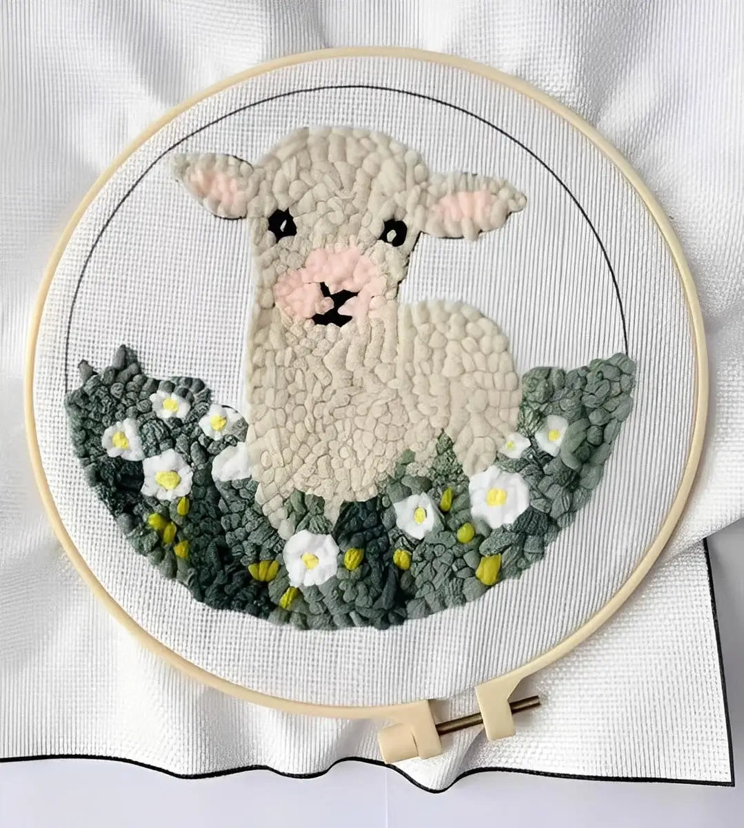 CraftHoop Farm Friends Punch Needle Kit adorable sheep design with flowers in a hoop, showcasing vibrant textures.