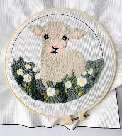 CraftHoop Farm Friends Punch Needle Kit adorable sheep design with flowers in a hoop, showcasing vibrant textures.
