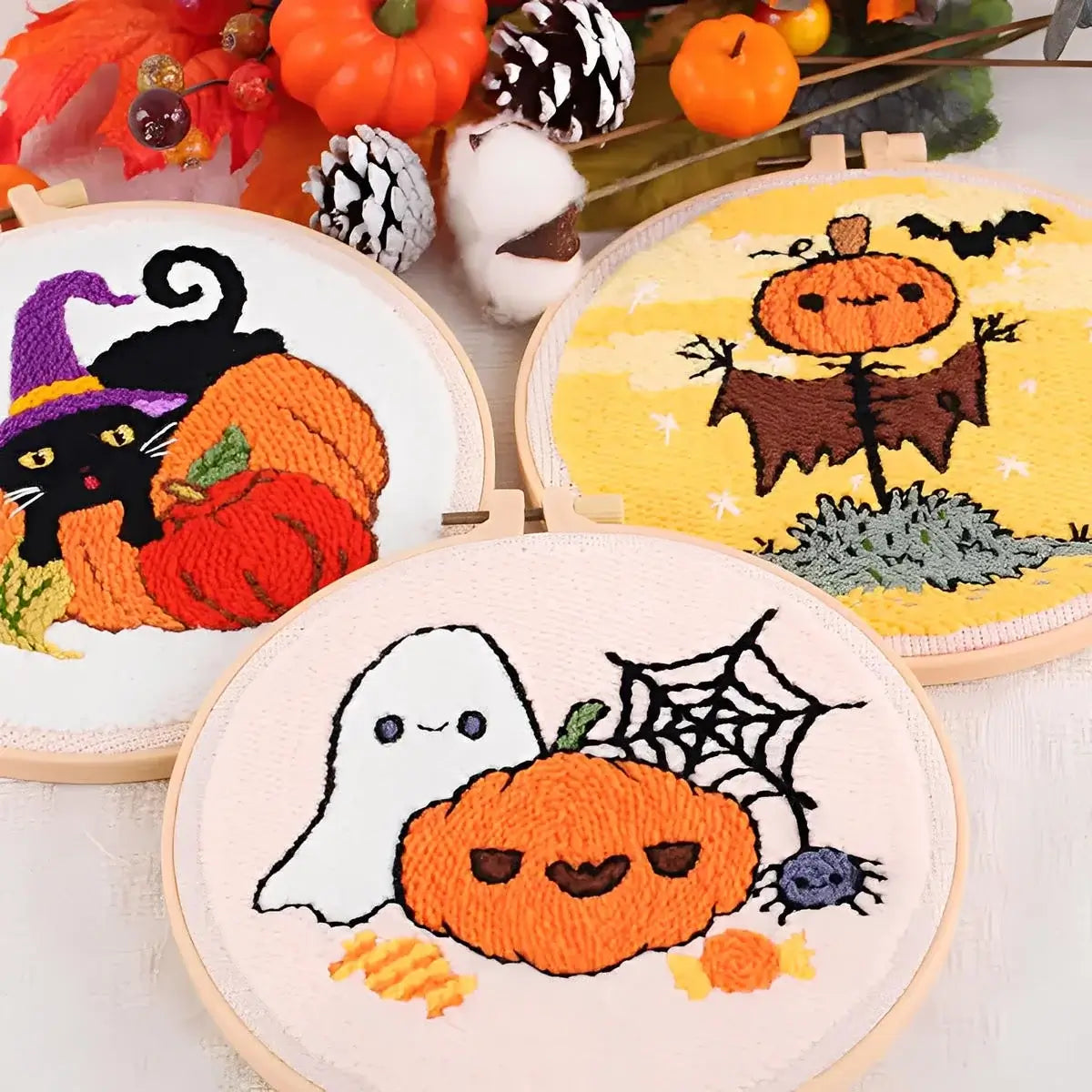 CraftHoop Pumpkin Halloween Punch Needle Kit featuring playful Halloween designs of pumpkins, a black cat, ghost, and scarecrow.