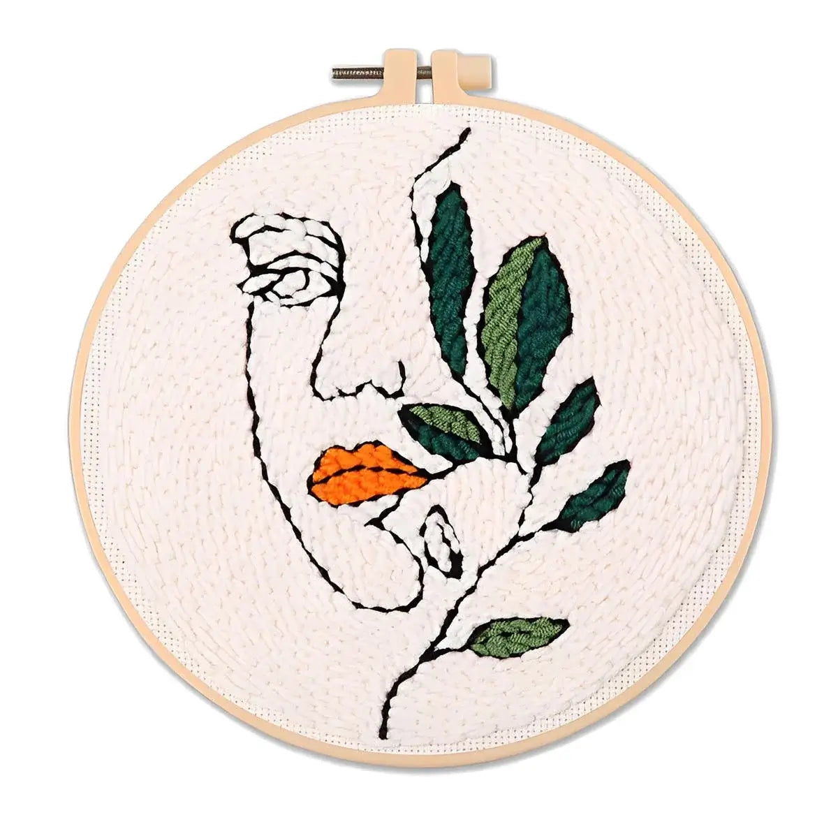 CraftHoop Botanical Muse Punch Needle Kit featuring abstract face and lush greenery design.