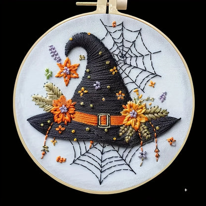 CraftHoop Crow Magic Halloween Embroidery Kit featuring a witch hat with flowers and spider webs.