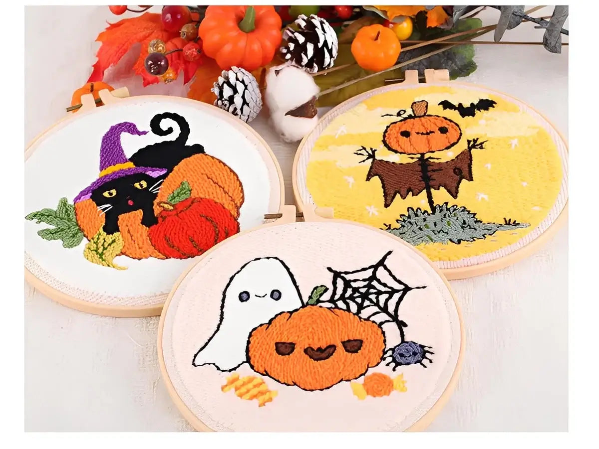 CraftHoop Pumpkin Halloween Punch Needle Kit showcasing playful Halloween designs with pumpkins, a cat, ghost, and scarecrow.