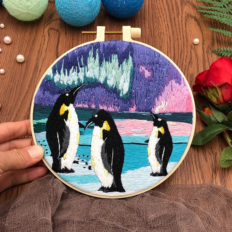 CraftHoop penguin family embroidery with snowy landscape - Fun and engaging DIY needlework project