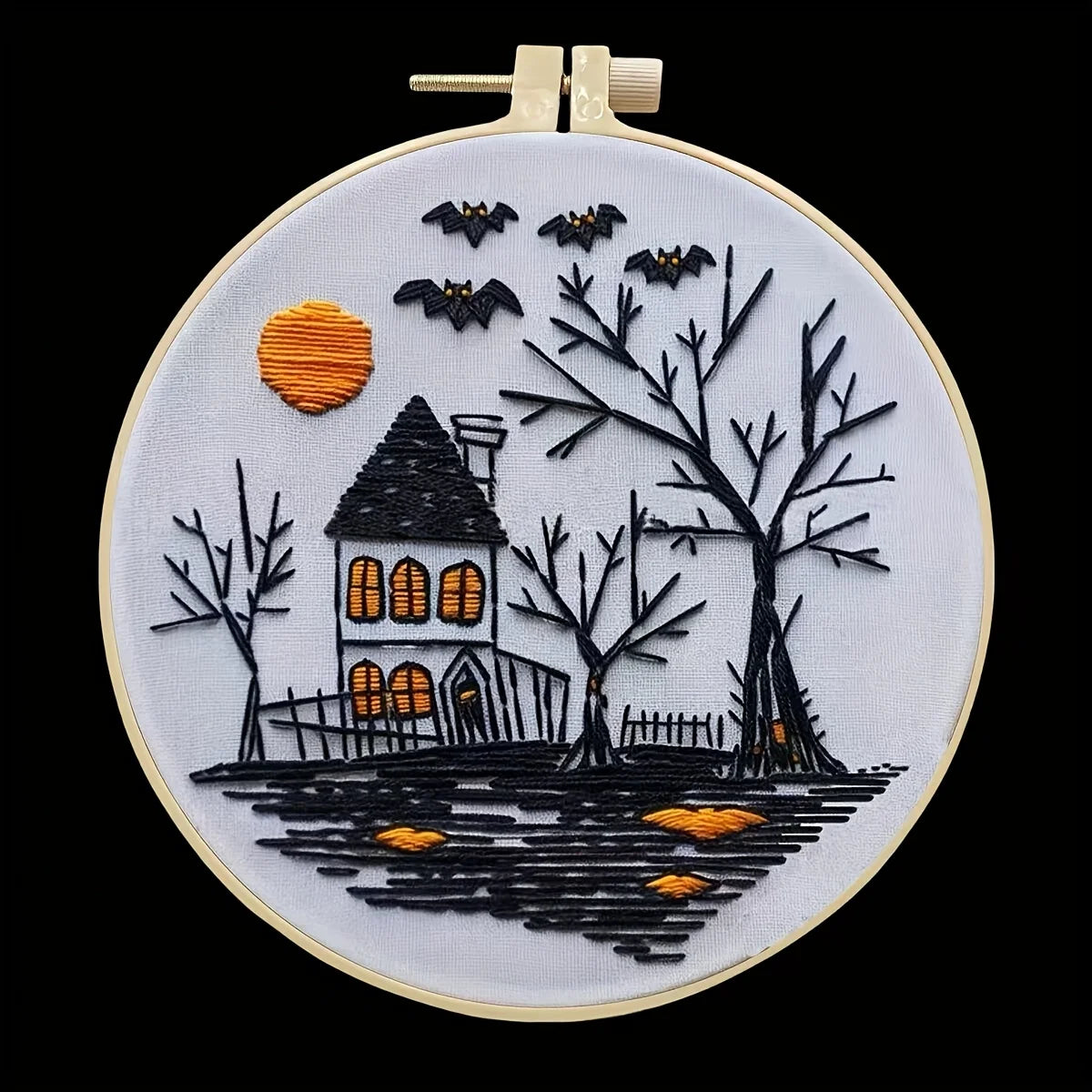 CraftHoop Crow Magic Halloween Embroidery Kit featuring a spooky house, bats, and autumn trees.