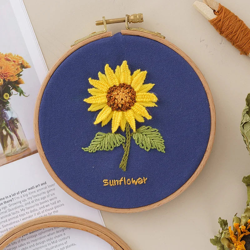 CraftHoop yellow sunflower embroidery on dark blue fabric - Vibrant DIY sewing kit for crafters