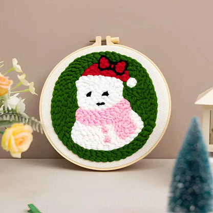 CraftHoop Christmas Cheer Punch Needle Kit featuring a cozy snowman design in festive colors.