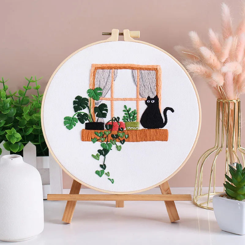 Completed CraftHoop Cat Lover’s Home Kit embroidery hoops displayed in a row.