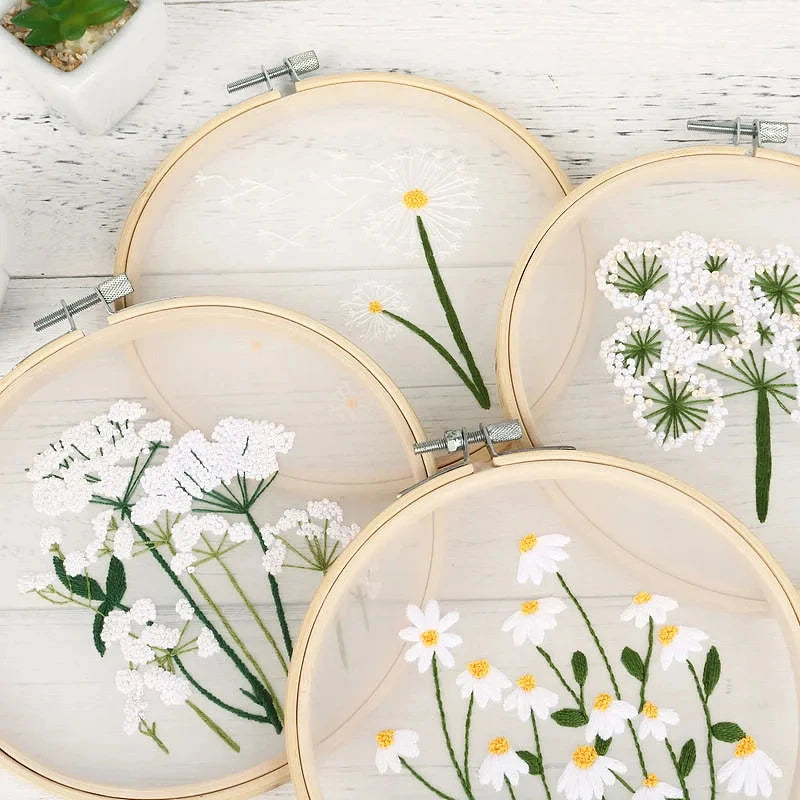 CraftHoop close-up of white flower embroidery designs - Beautiful DIY needlework projects