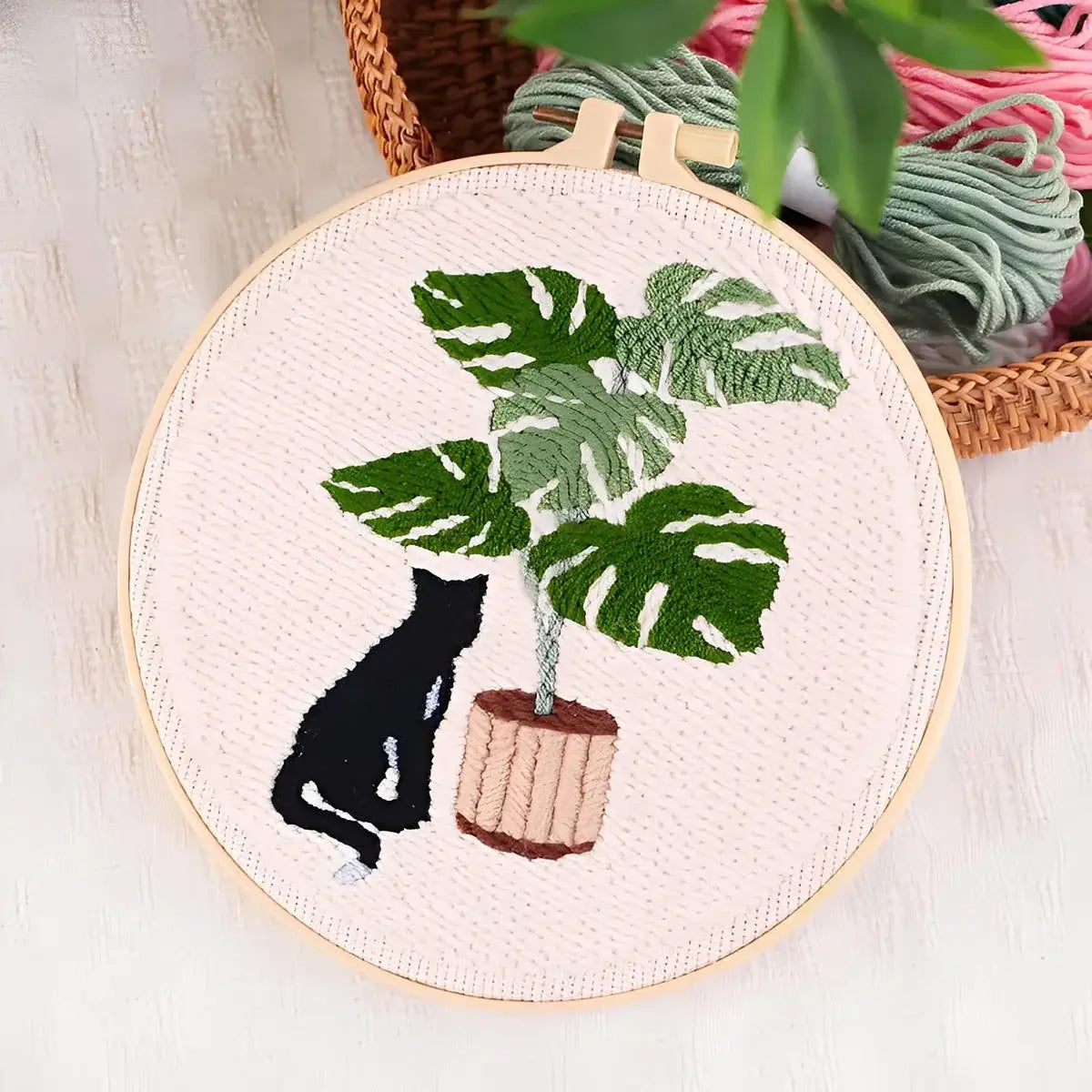 CraftHoop Cat & Plant Lovers Punch Needle Kit featuring a black cat and a lush plant design.