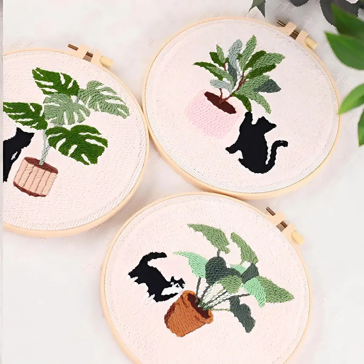 CraftHoop Cat & Plant Lovers Punch Needle Kit featuring embroidered plants and playful cats in hoop designs.