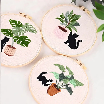 CraftHoop Cat & Plant Lovers Punch Needle Kit featuring embroidered plants and playful cats in hoop designs.