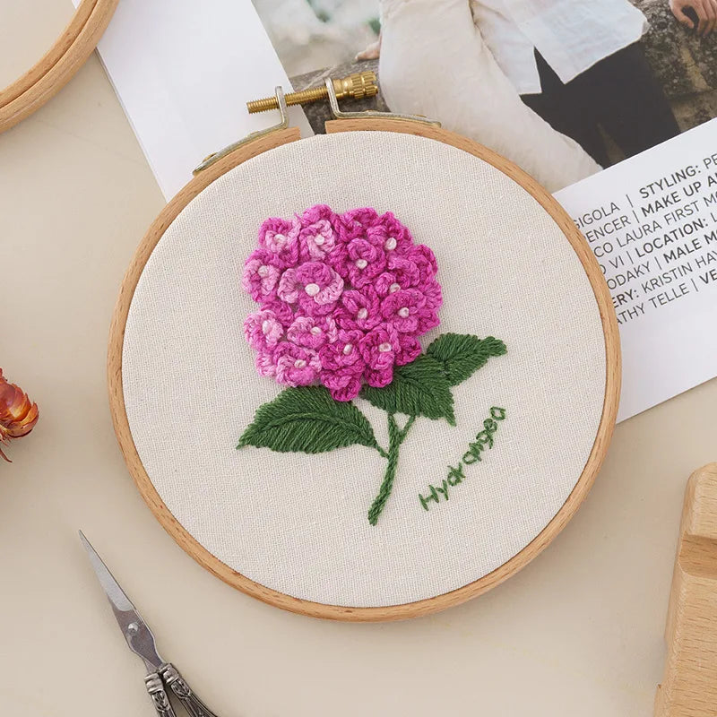 CraftHoop pink flower embroidery on white fabric - Elegant and easy needlework project