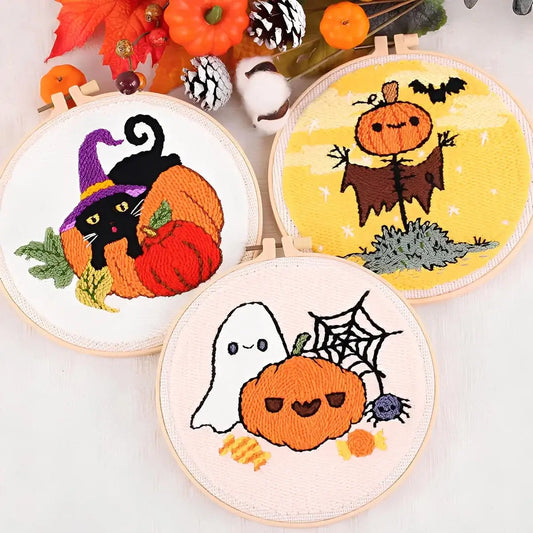 CraftHoop Pumpkin Halloween Punch Needle Kit featuring playful Halloween designs of pumpkins, a black cat, and a ghost.