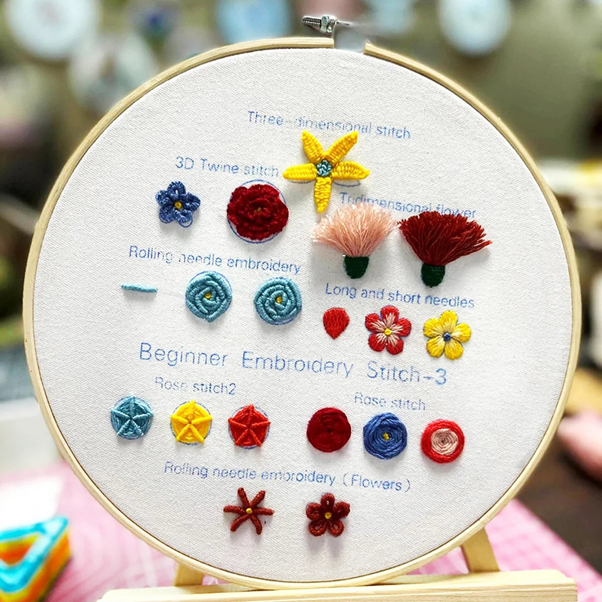 Close-up of a CraftHoop Practice Embroidery hoop with different stitch examples.