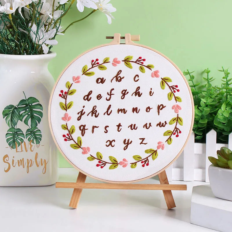 Finished CraftHoop Beginner's Alphabet Embroidery Kit showing detailed stitching of alphabet letters.