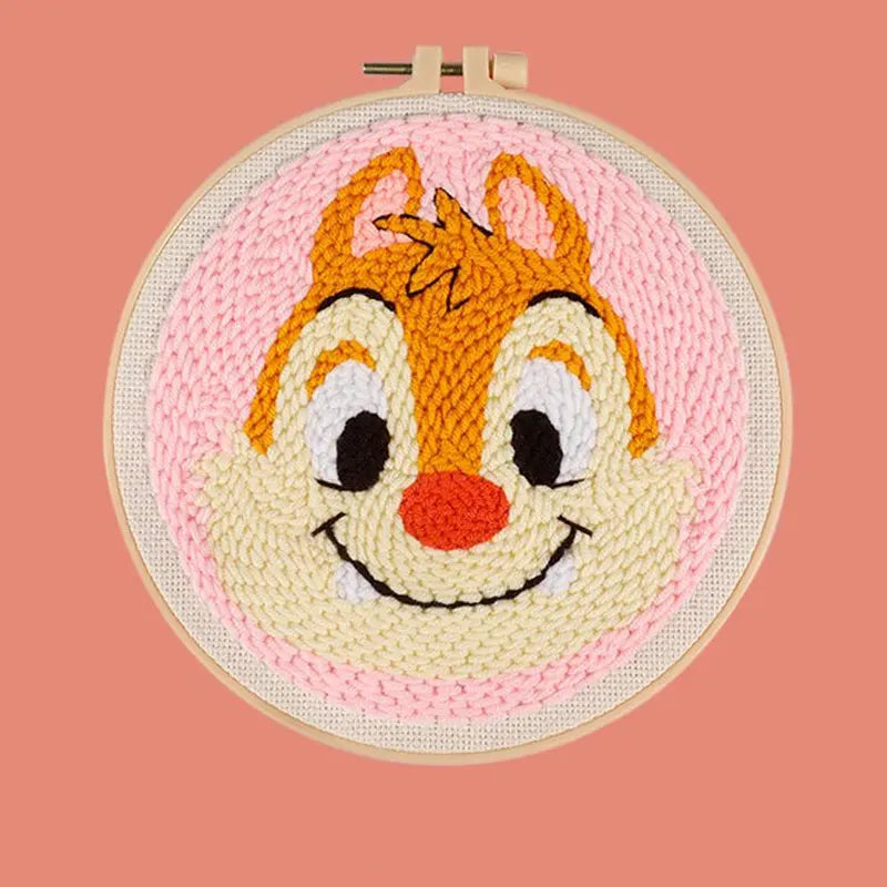 CraftHoop orange cartoon character embroidery on pink fabric - Adorable and creative needlework project