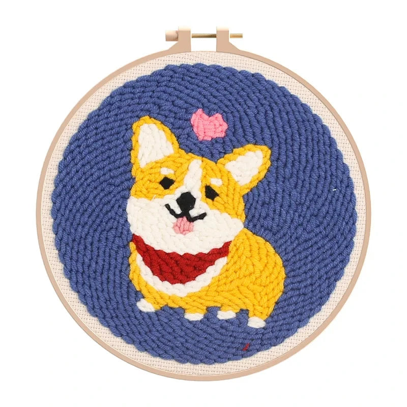 CraftHoop happy Corgi dog embroidery on blue fabric - Fun and engaging needlework kit