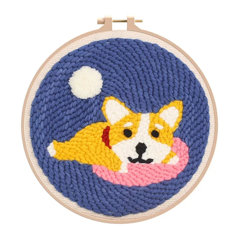 CraftHoop Corgi dog face embroidery with moon on blue fabric - Cute and whimsical DIY sewing project