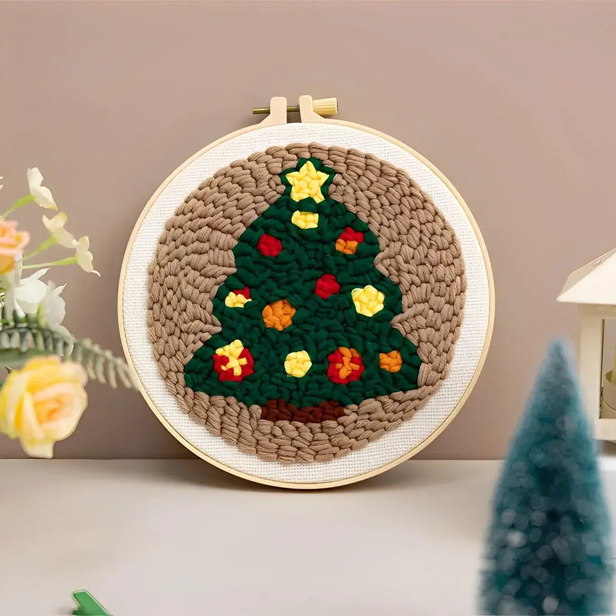 CraftHoop Christmas Cheer Punch Needle Kit featuring a festive Christmas tree design in a hoop.