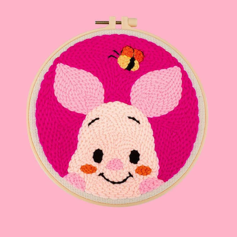 CraftHoop pink cartoon character embroidery on pink fabric - Adorable and fun DIY sewing project