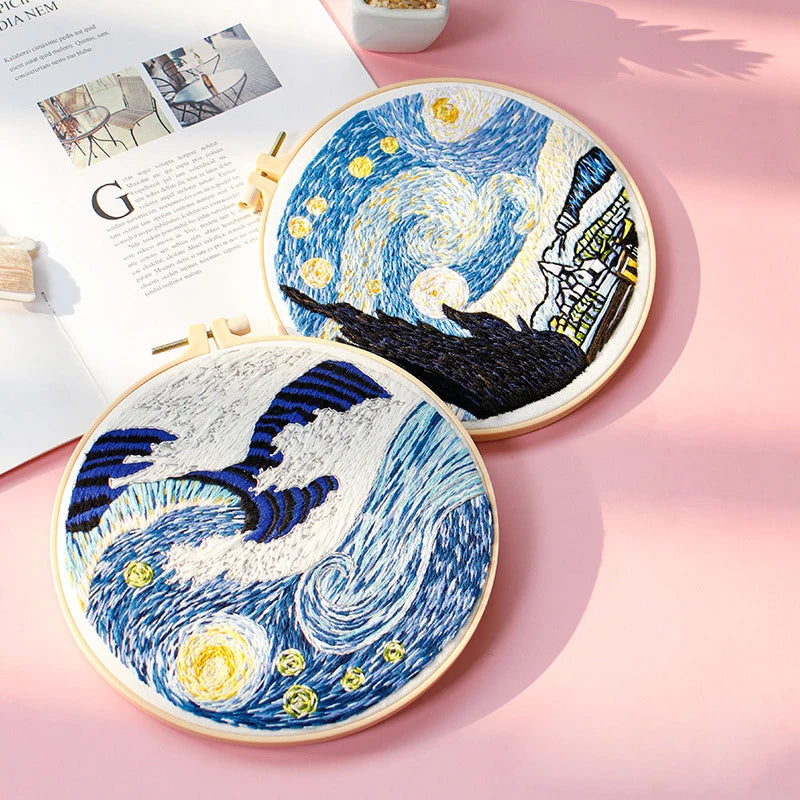 Collection of starry night-themed embroidery kits from CraftHoop, featuring various designs on blue fabric, displayed together in a decorative arrangement