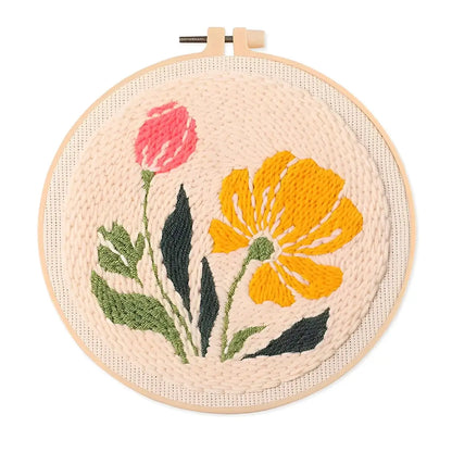 CraftHoop Garden Joy Punch Needle Kit showcasing vibrant tulips and sunflowers, perfect for brightening any space.