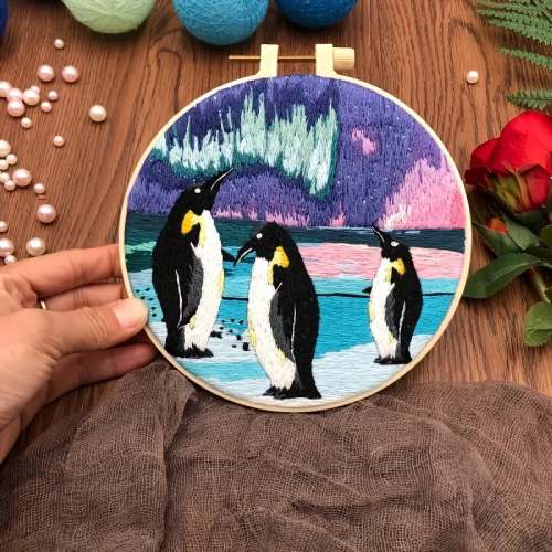 CraftHoop penguin family with snowy landscape embroidery - Fun and engaging DIY project for all ages